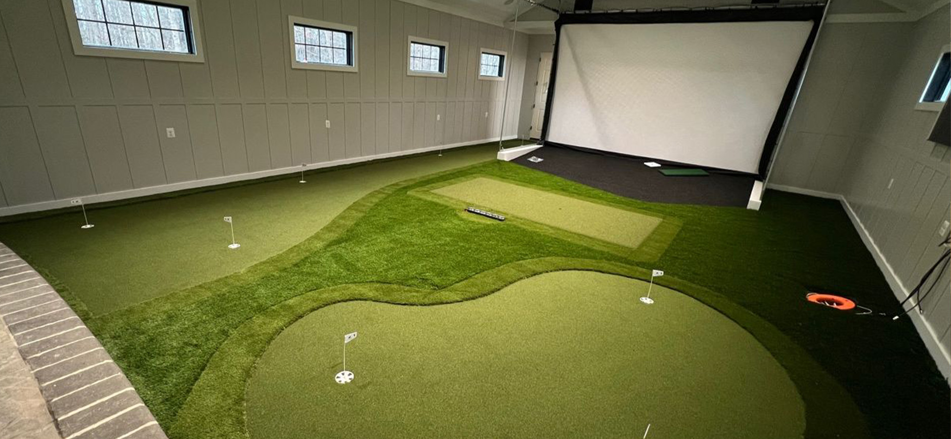 Residential Golf Simulator and Custom Putting Greens