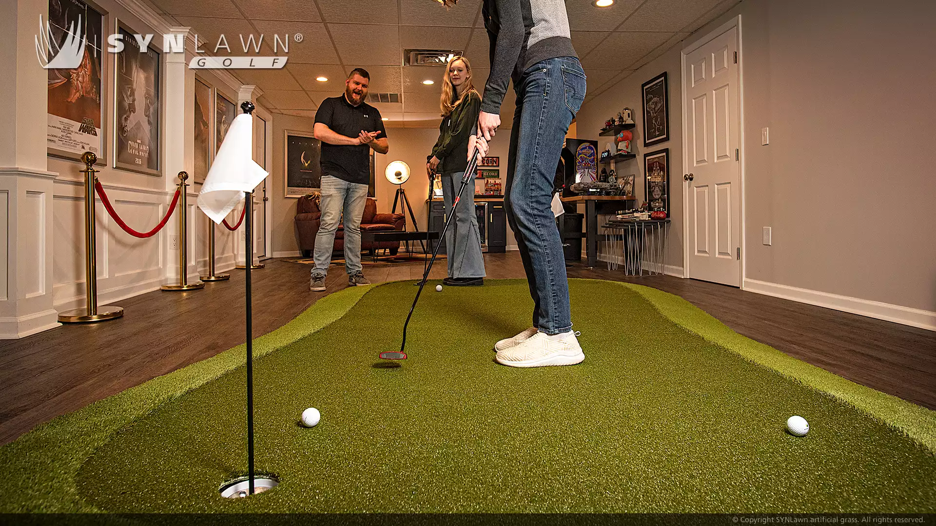 image of golfers playing on the SYNLawn Golf Greenmaker practice putting green